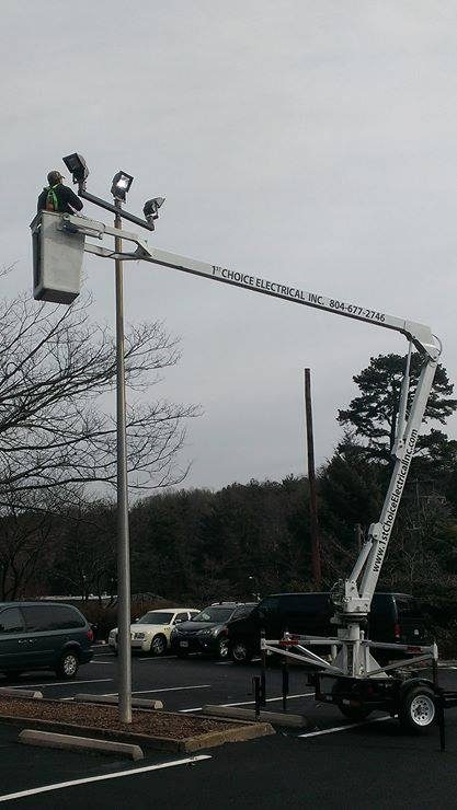 1st Choice Electrical crew installing a light pole